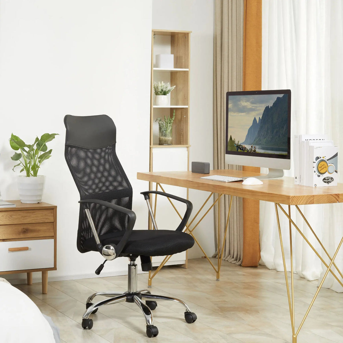 Black ergonomic office chair at a bright modern workstation