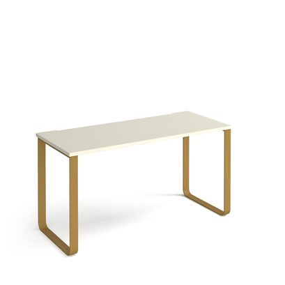 Minimalist desk with white surface and gold metal legs on a white background