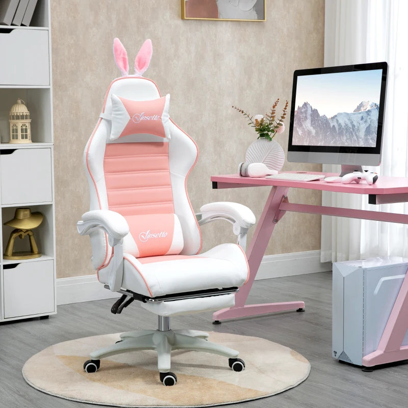 Pink and white gaming chair with bunny ears in a room with a desk and computer.