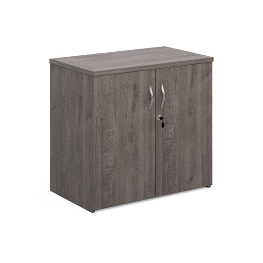 A wooden cupboard with grey finish, featuring a pair of lockable doors with silver handles and a solid back panel.