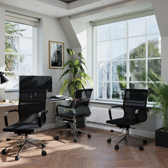 Modern office with black chairs and large windows