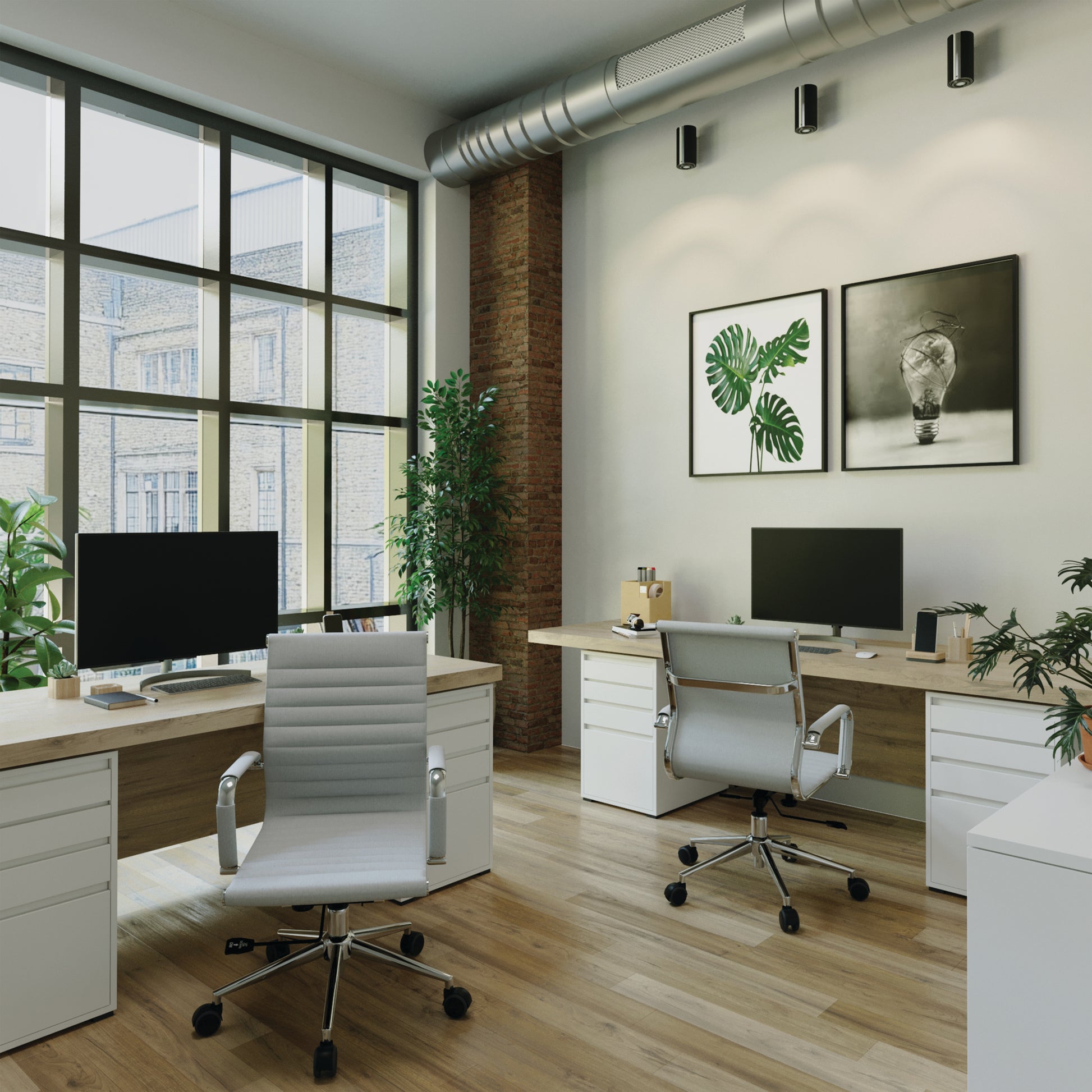 Modern office space with two desks, chairs, and decorative elements.