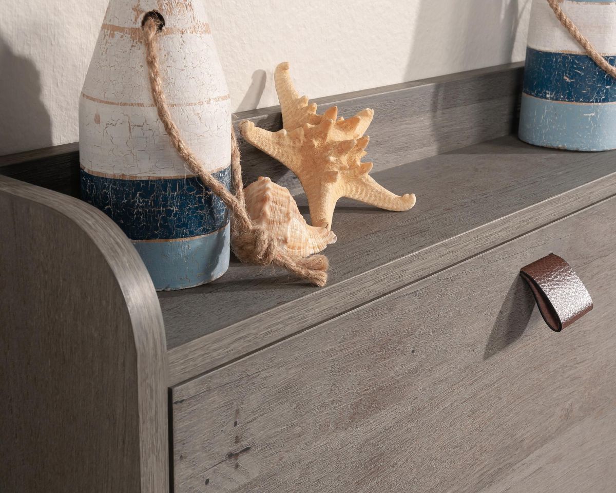 Decorative items on a wooden surface with a rustic theme