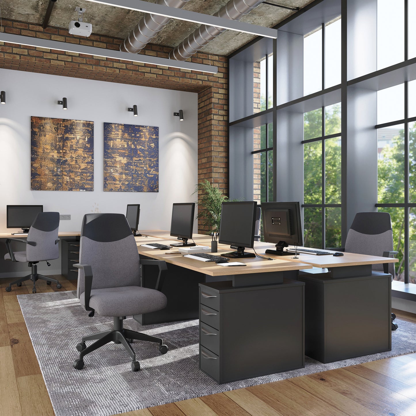 Modern office interior with desks, chairs, and large windows.