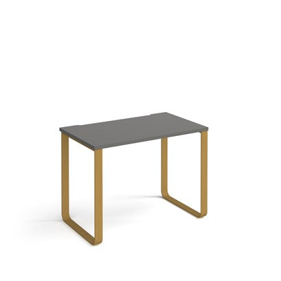 Small table with a grey top and gold legs on a white background