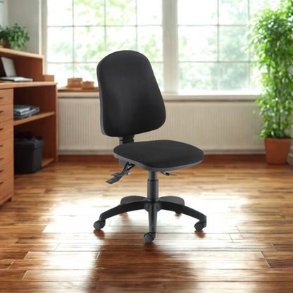 Black office chair in a bright room with wooden floor and large windows.
