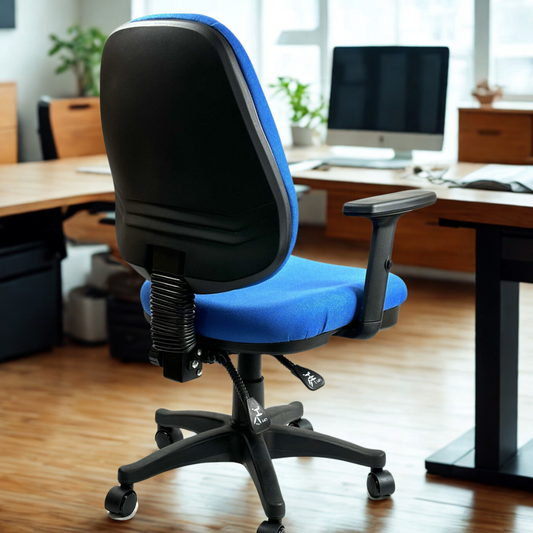 Blue office chair in an office setting with a desk and computer monitor.
