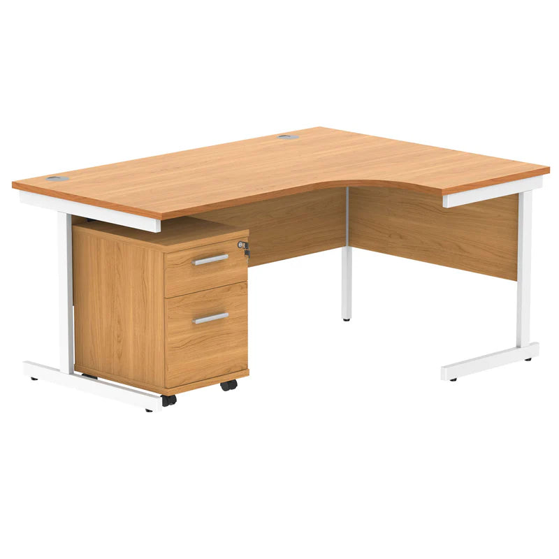 Wooden L-shaped desk with white legs on a white background
