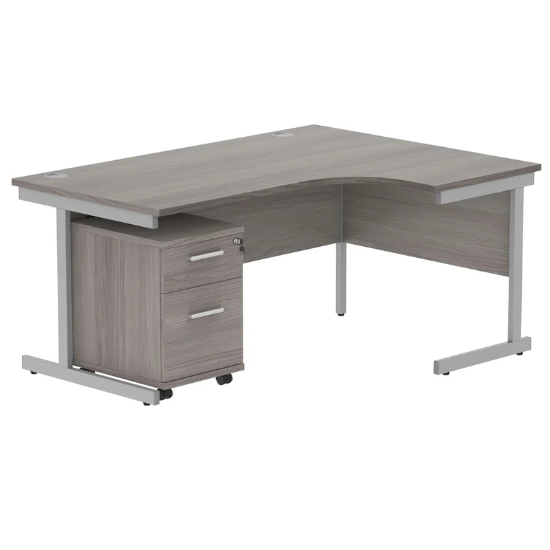 Corner office desk with gray finish and silver legs on a white background