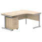 Wooden L-shaped desk with silver legs on a white background