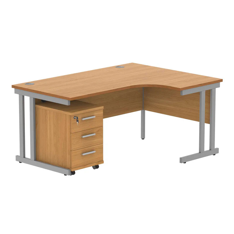 Wooden L-shaped desk with silver legs on a white background