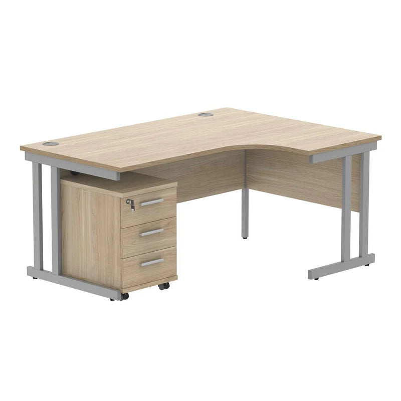 Wooden L-shaped desk with silver metal legs on a white background