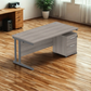 Wooden office desk with a cabinet on a wooden floor