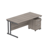 Wooden office desk with a drawer unit on a white background