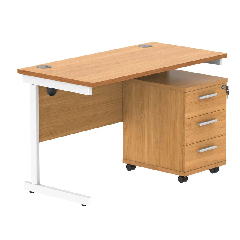 Wooden office desk with white legs and three drawers on a white background