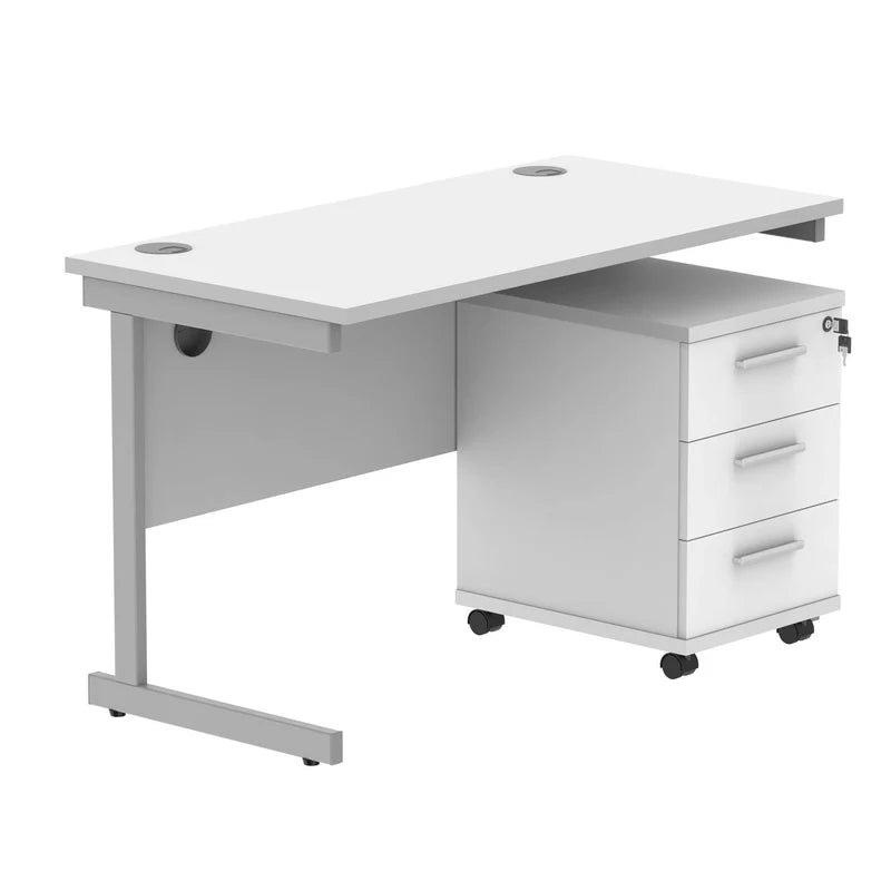 White office desk with a silver frame and three drawers on a white background
