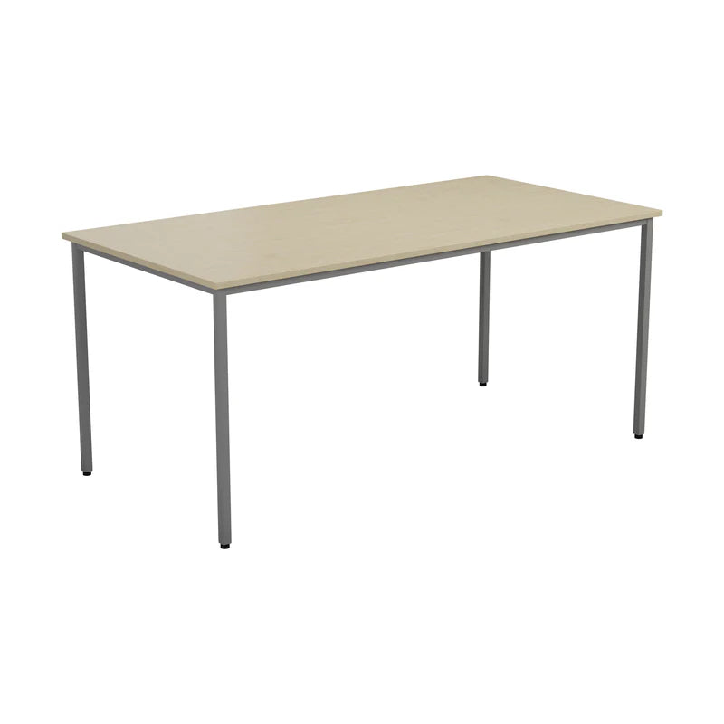 Rectangular table with beige top and silver legs on a white background