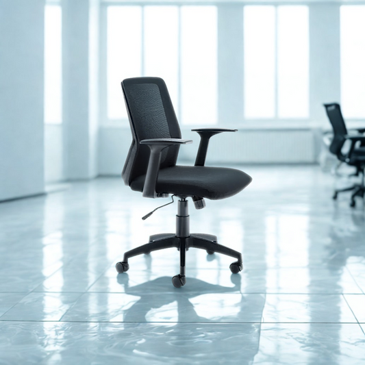 Black office chair in a modern office setting with large windows.