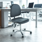 Black office chair in a modern office setting with desks and computers.
