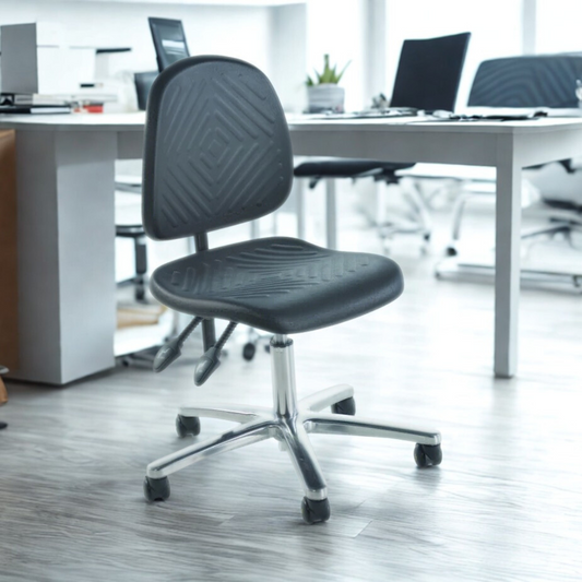 Black office chair in a modern office setting with desks and computers.