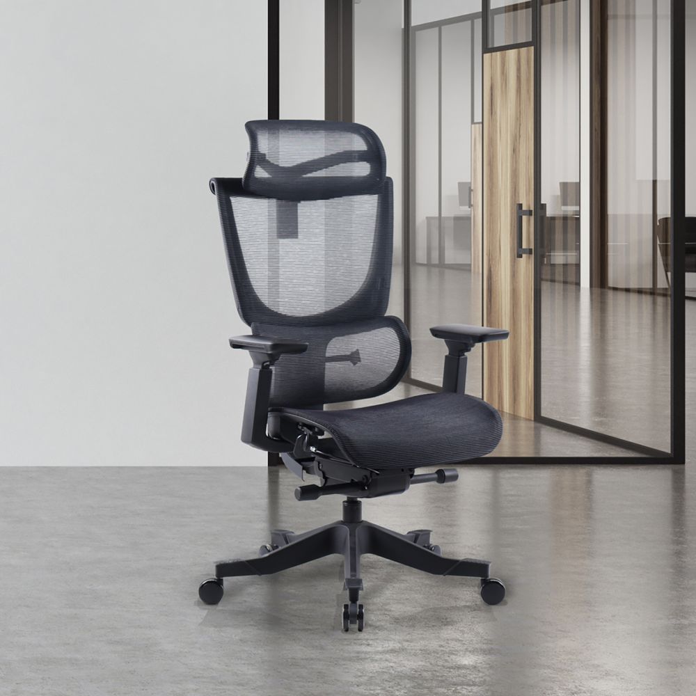 Black office chair in a modern office setting with glass walls.