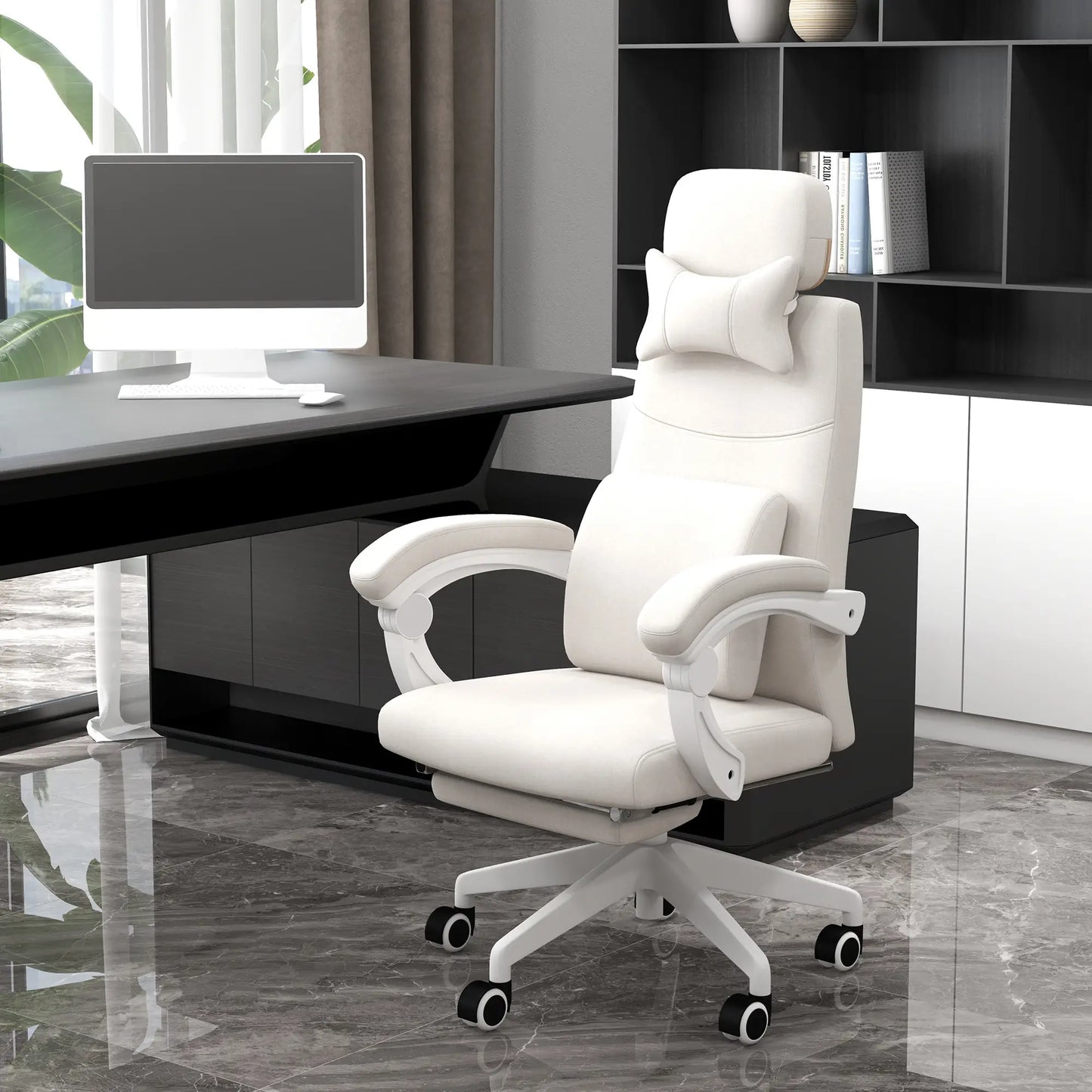 Cream office chair in a modern office setting with a desk and computer.