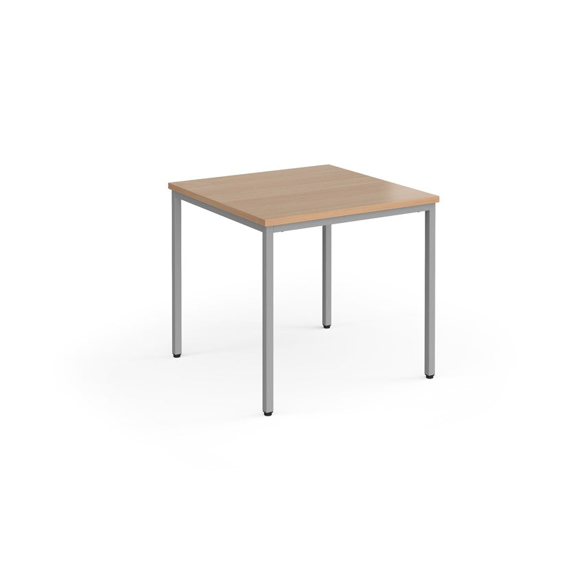 A rectangular conference room table with a wood-like tabletop and a gray steel frame.