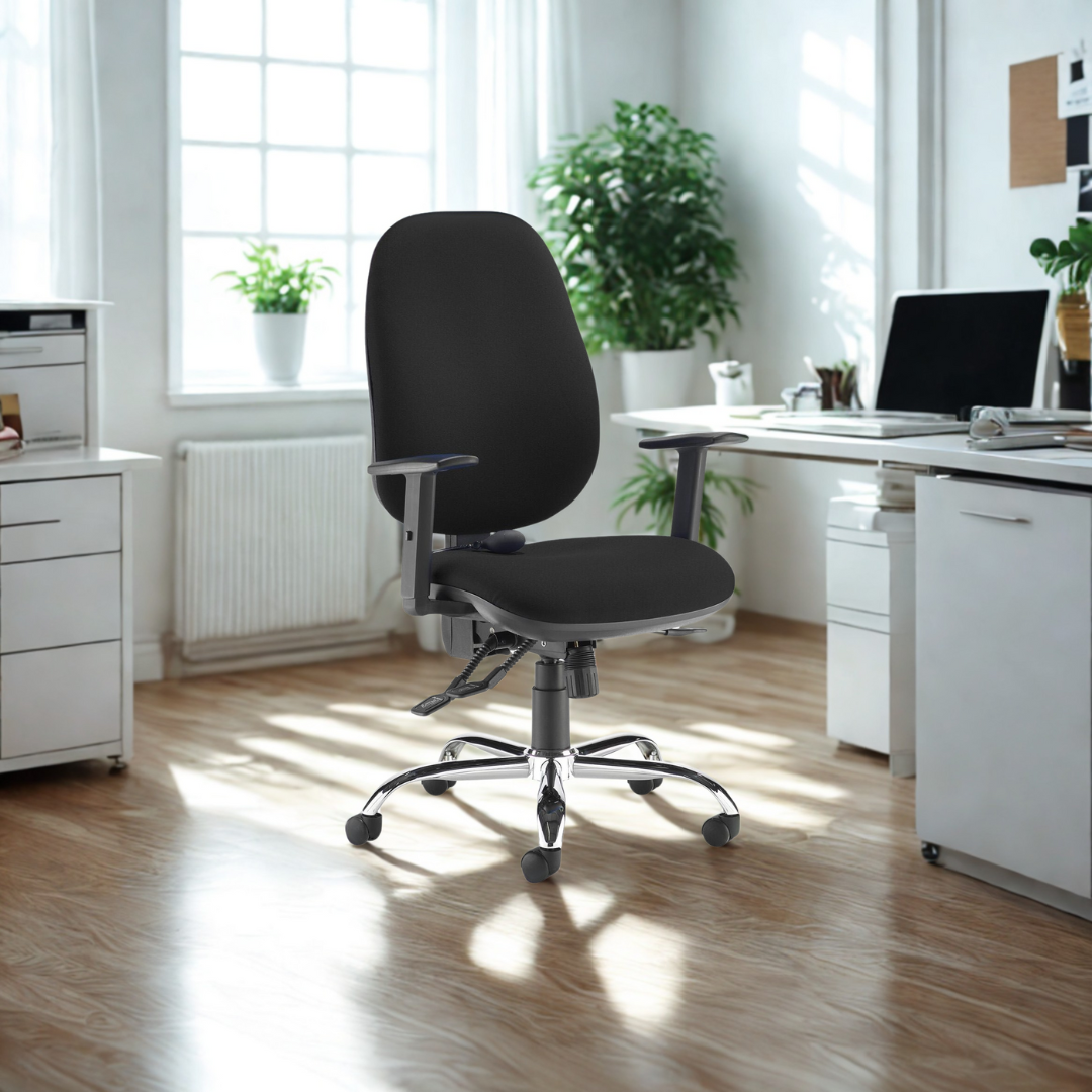 Black office chair in a bright office setting with white furniture and plants.