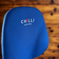Blue chair with 'Chilli Seating' logo on a wooden floor background