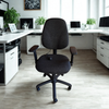 Black office chair in a modern office setting with desks and computers.