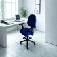 Blue office chair in front of a white desk with a laptop in a bright room.