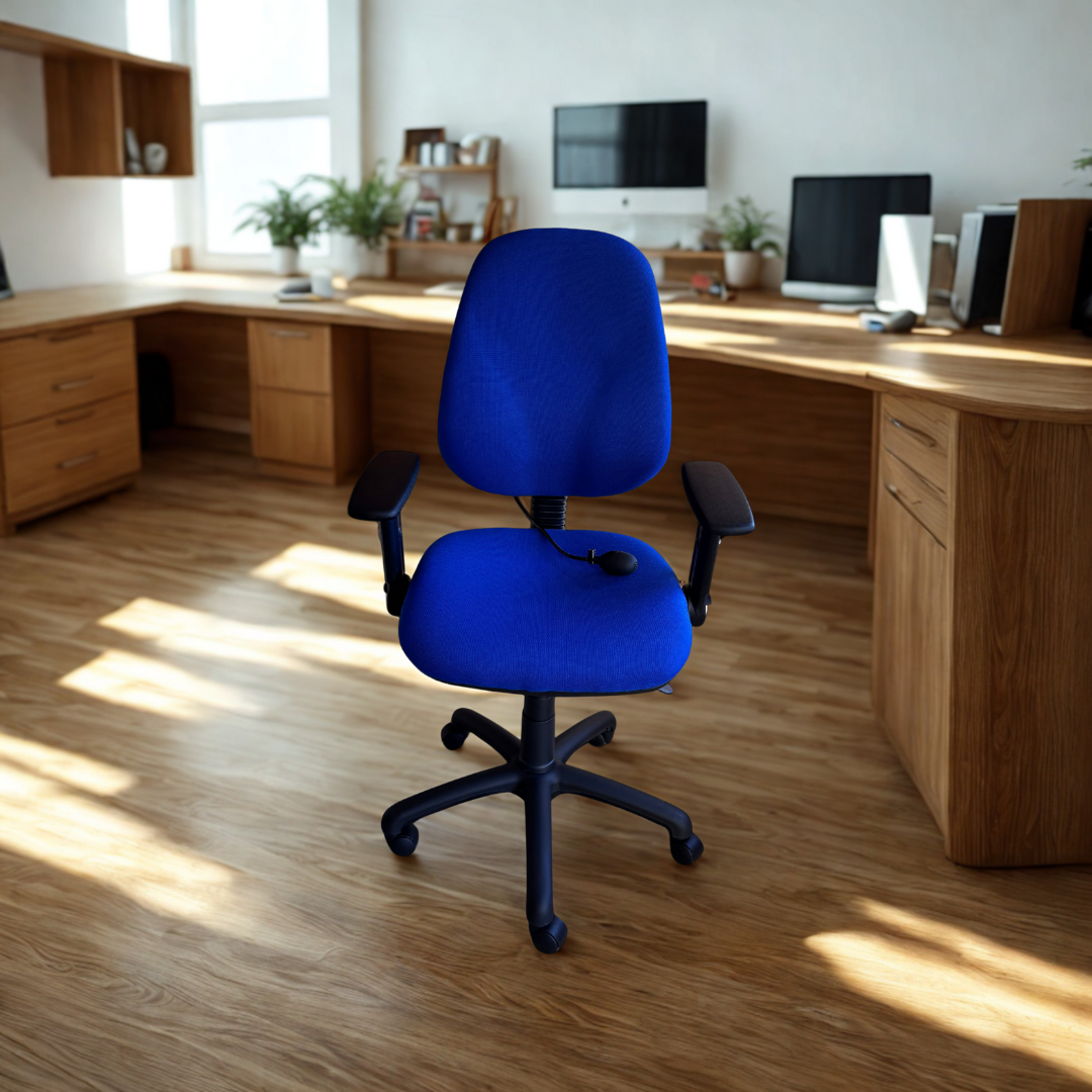 Blue office chair in a home office setting with wooden desks and computer equipment.