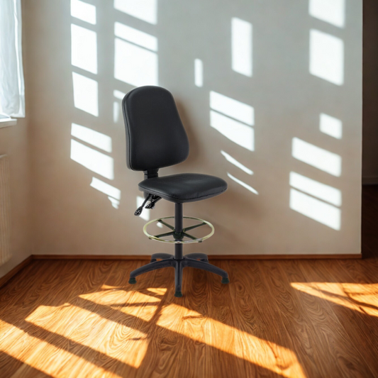 Black office chair in a room with sunlight casting shadows on the wall.