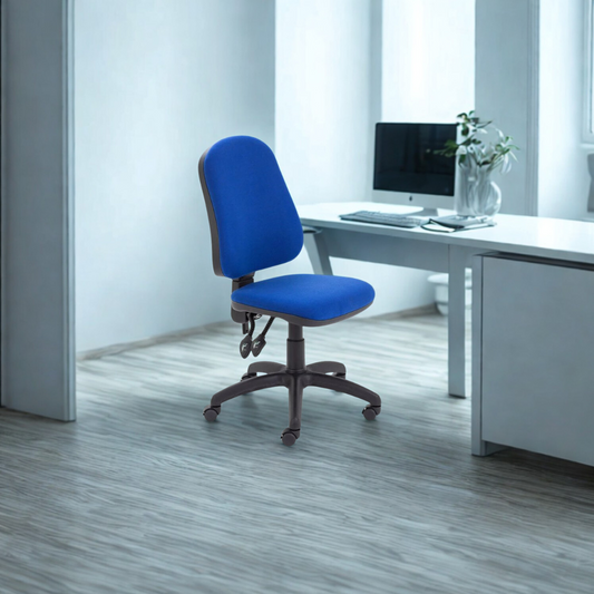 Blue office chair in front of a white desk with a computer setup.
