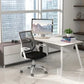 Modern office setup with a desk, chair, and computer in a bright room.