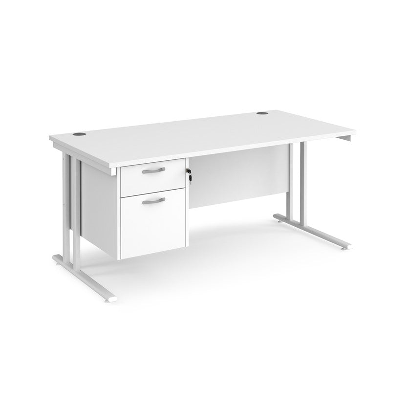 Rectangular office desk with a cantilever frame and a White two-drawer fixed pedestal. The desk has a melamine finish and is pictured against a white background.

