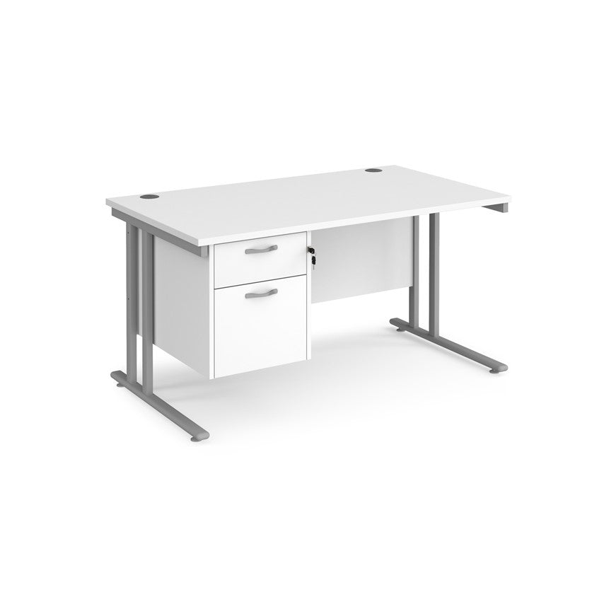 Rectangular office desk with a cantilever frame and a White two-drawer fixed pedestal. The desk has a melamine finish and is pictured against a white background.
