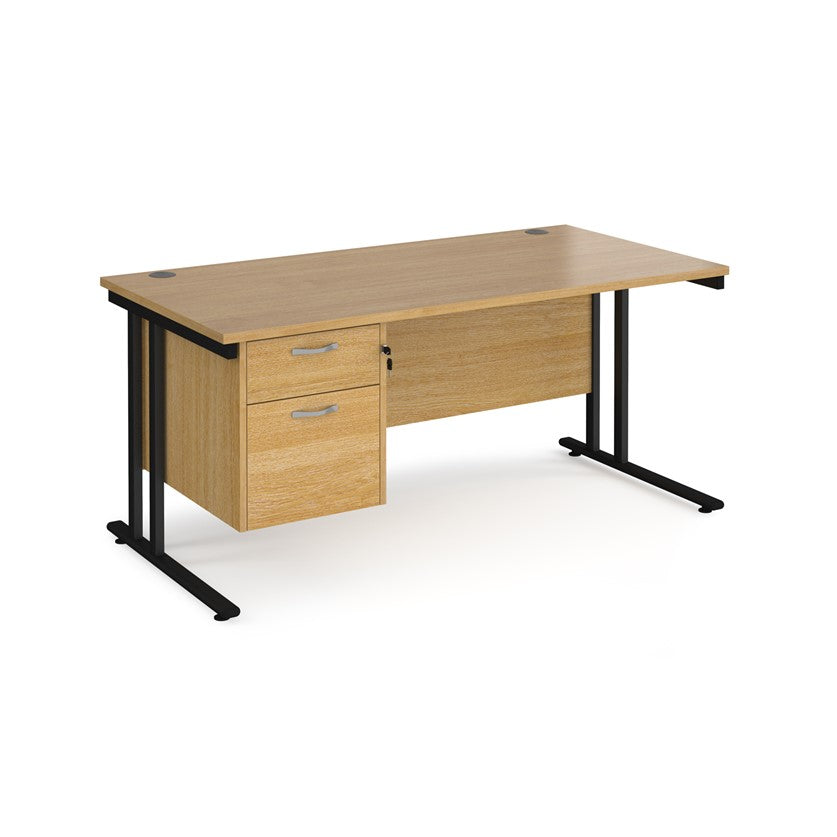 Rectangular office desk with a cantilever frame and a beige two-drawer fixed pedestal. The desk has a melamine finish and is pictured against a white background.

