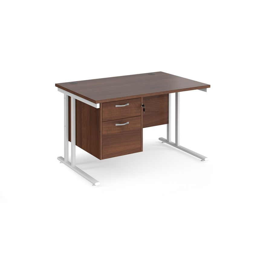 Rectangular office desk with a cantilever frame and a beige two-drawer fixed pedestal. The desk has a melamine finish and is pictured against a white background.
