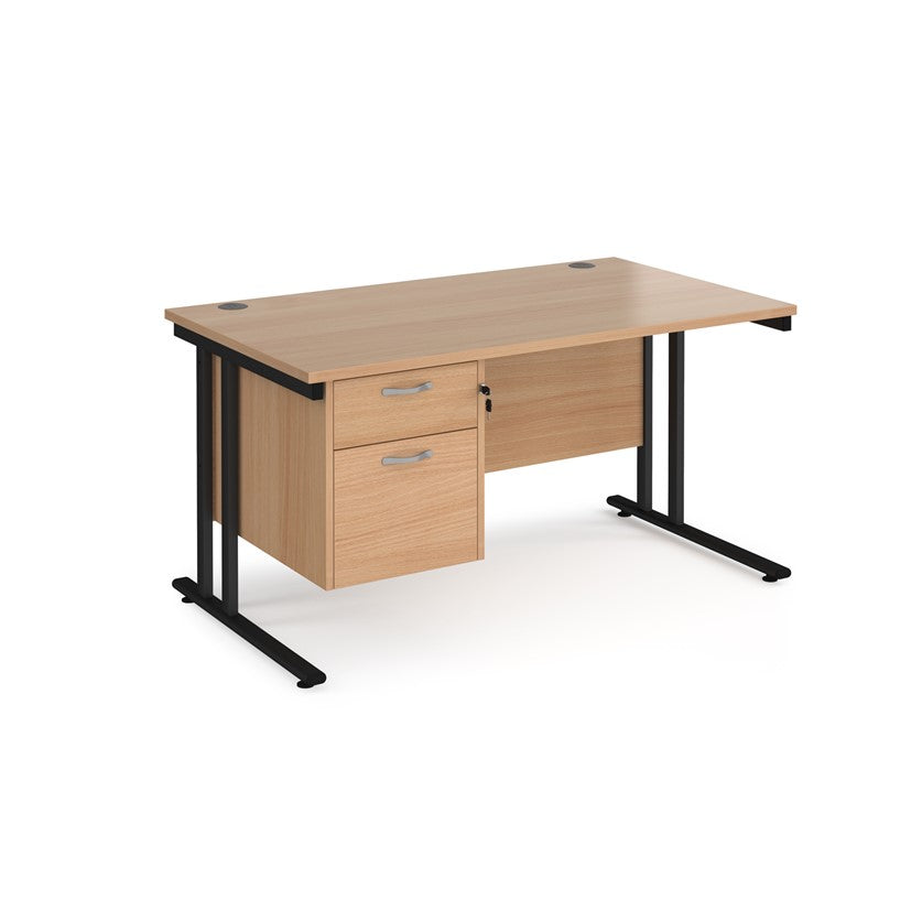 Rectangular office desk with a black cantilever frame and a beige two-drawer fixed pedestal. The desk has a melamine finish and is pictured against a white background.