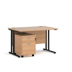 A Oak finish desk with a 2 drawer pedestal bundle on a white background
