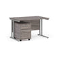 A Grey finish desk with a 2 drawer pedestal bundle on a white background