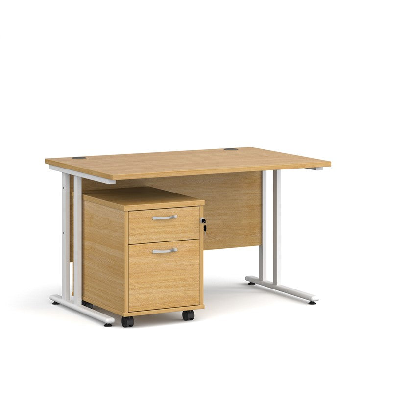 A Oak finish desk with a 2 drawer pedestal bundle on a white background