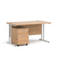 A oak finish desk with a 2 drawer pedestal bundle on a white background