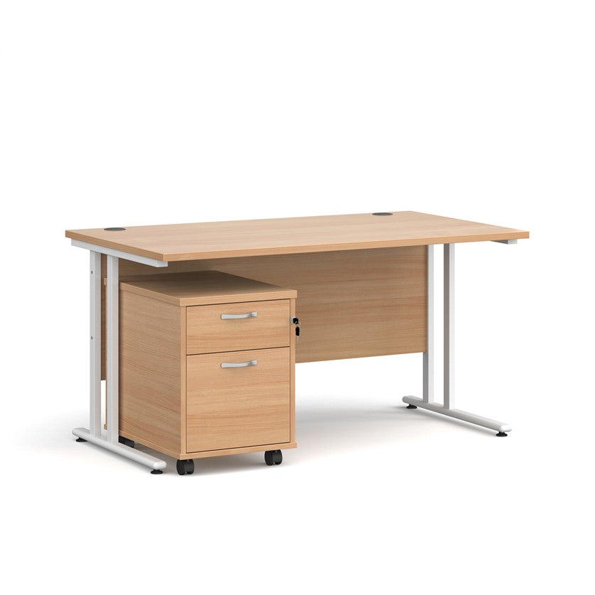 A oak finish desk with a 2 drawer pedestal bundle on a white background