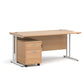 A oak finish desk with a 2 drawer pedestal bundle on a white background
