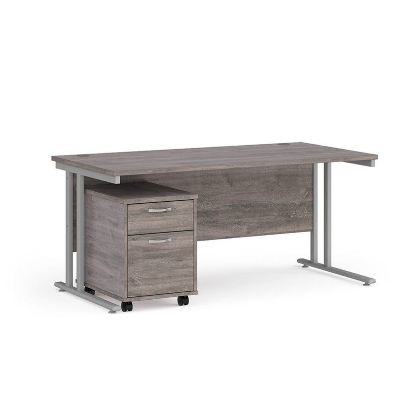 A Grey finish desk with a 2 drawer pedestal bundle on a white background
