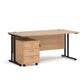 A Oak finish desk with a 3 drawer pedestal bundle on a white background