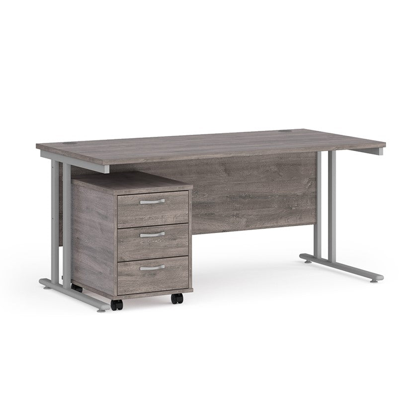 A Grey finish desk with a 3 drawer pedestal bundle on a white background