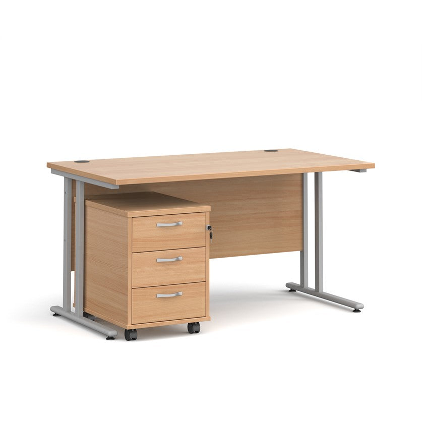 A Oak finish desk with a 3 drawer pedestal bundle on a white background